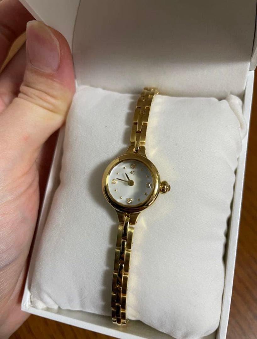 4℃ ゴールド アナログ腕時計