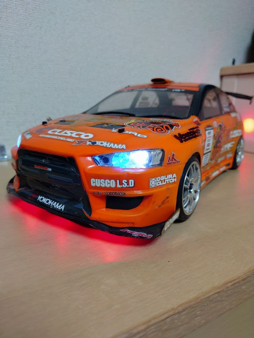 ヨコモ　ドリパケ　4WD　熊久保信重　 エボ X YUKE'S チームオレンジ