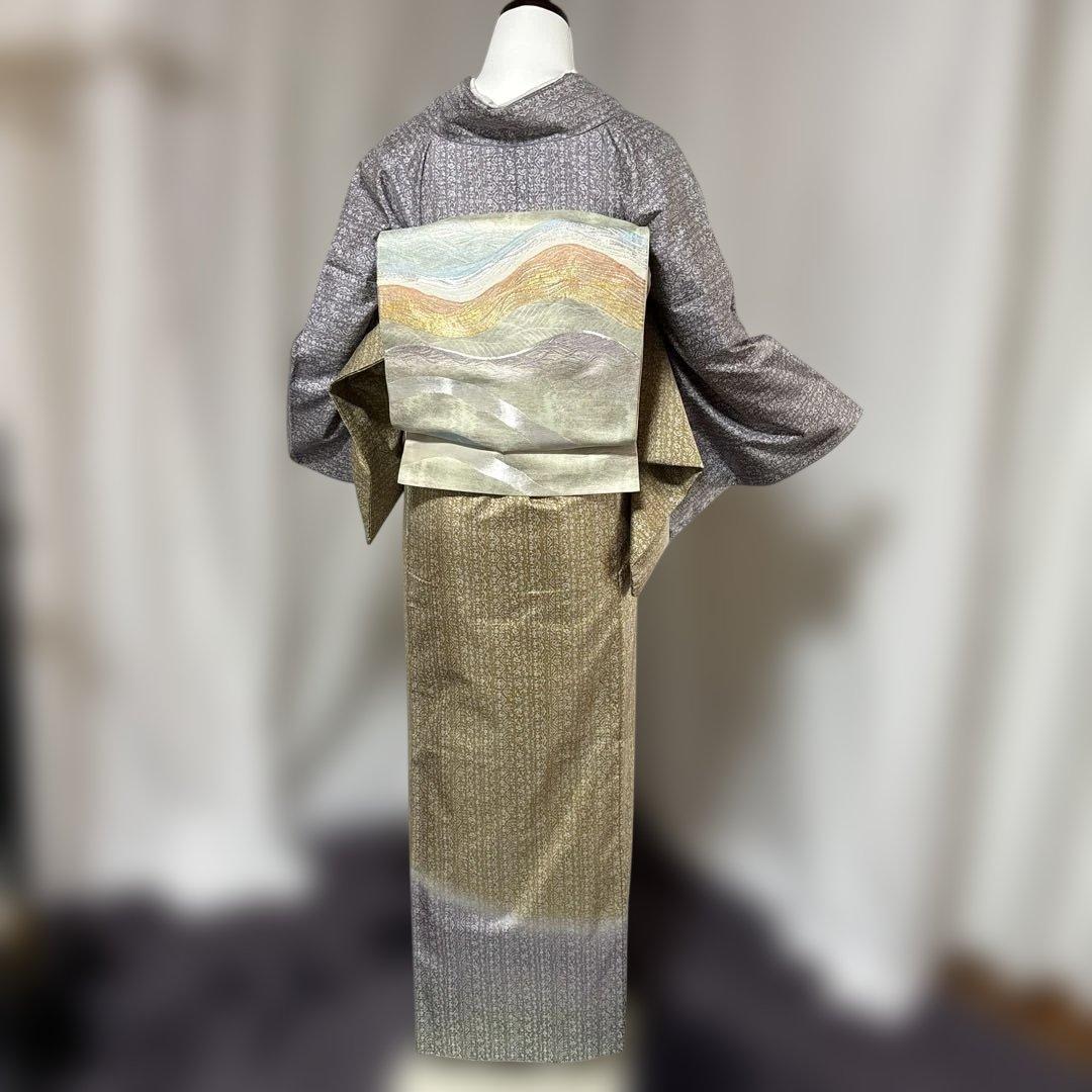 未使用近い　美品　袷　正絹　本場大島紬　フルセット　西陣綴れ織り袋帯