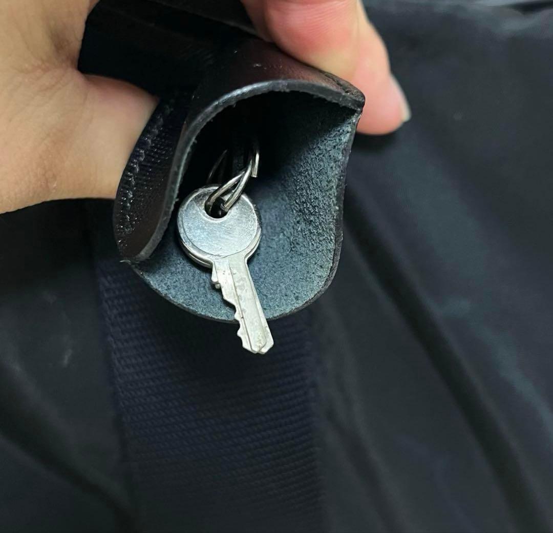 大容量 PRADA ボストンバッグ ブラック 三角ロゴ ナイロン　南京錠