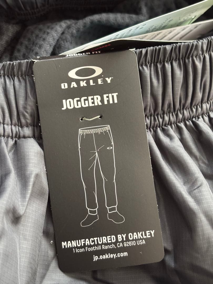 【新品未タグ付】オークリー ウインドブレーカー（上L・下M）保温 撥水 静音機能