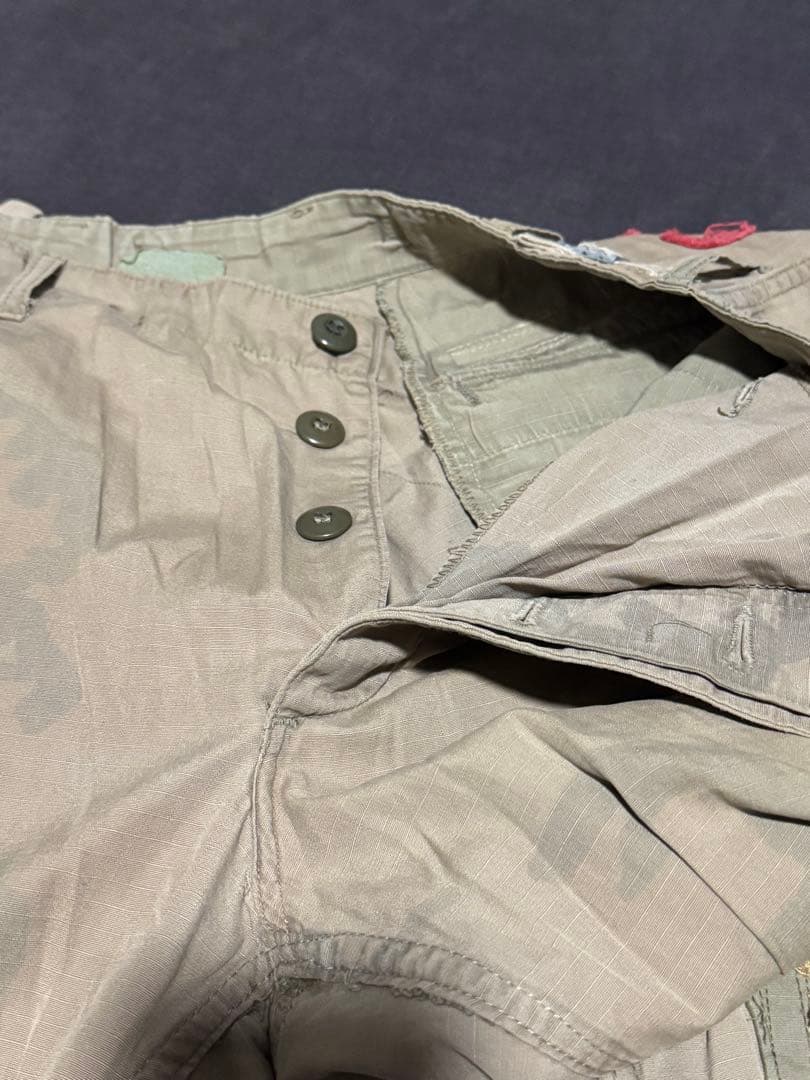 中国長城グレイトチャイナウォール　リメイクパンツカーキ