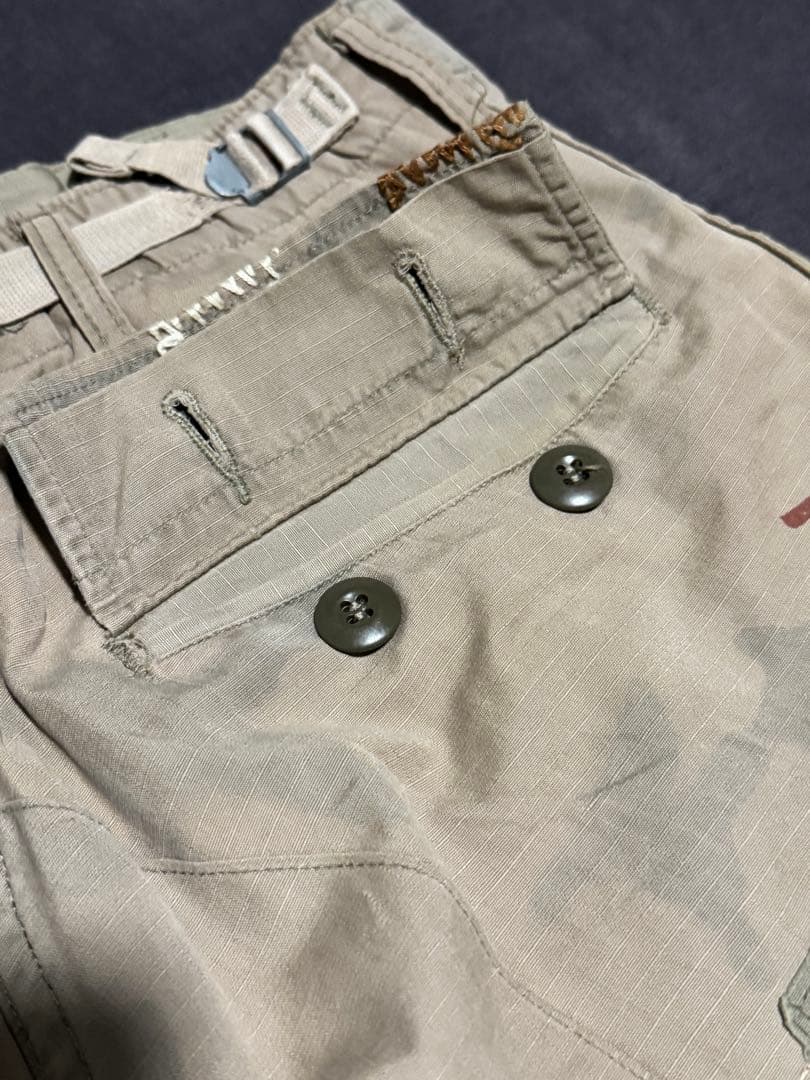 中国長城グレイトチャイナウォール　リメイクパンツカーキ