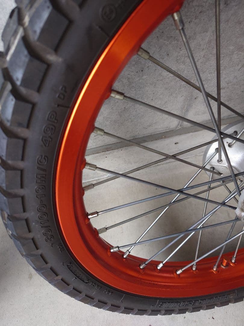 kj トリッカー250 前後ホイールタイヤセット オレンジ 前輪