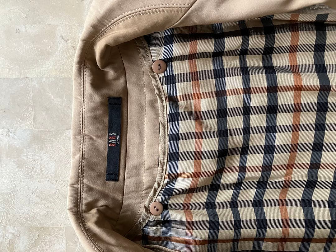 DAKSトレンチコート