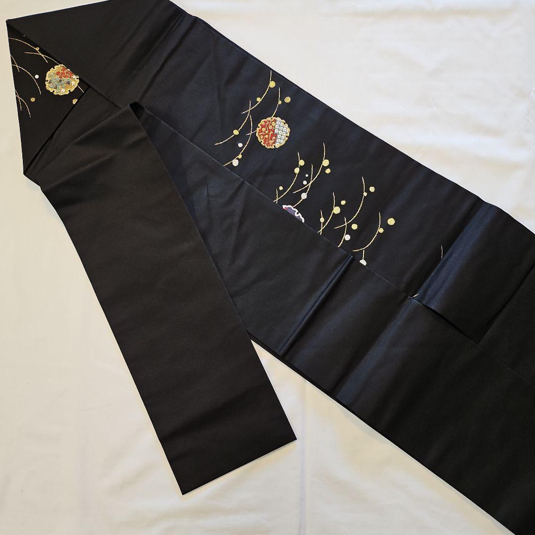 名古屋帯☆雪輪文様☆九寸☆露草☆正絹☆セミフォーマル☆黒地☆金彩