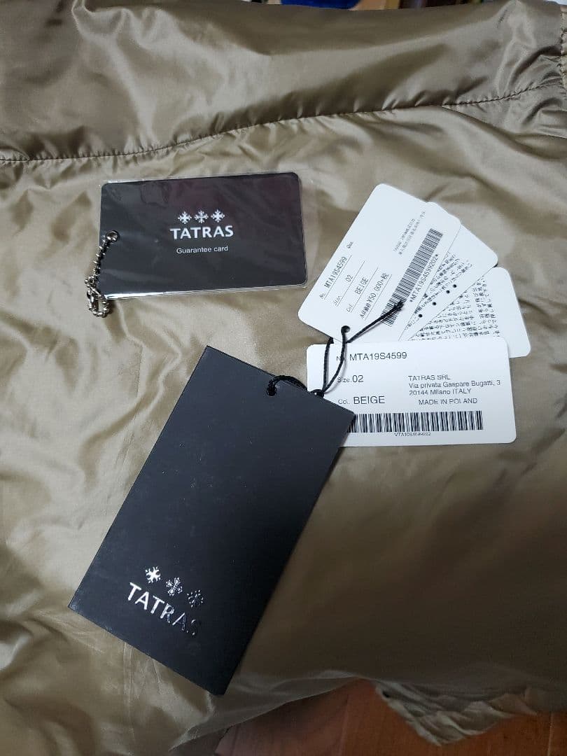 タグ付きTATRAS ベージュ キルティングダウンベスト