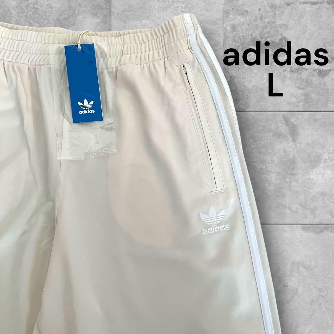 新品タグ付き✨アディダス トラックパンツ ファイヤーバードトラックパンツ 白 L