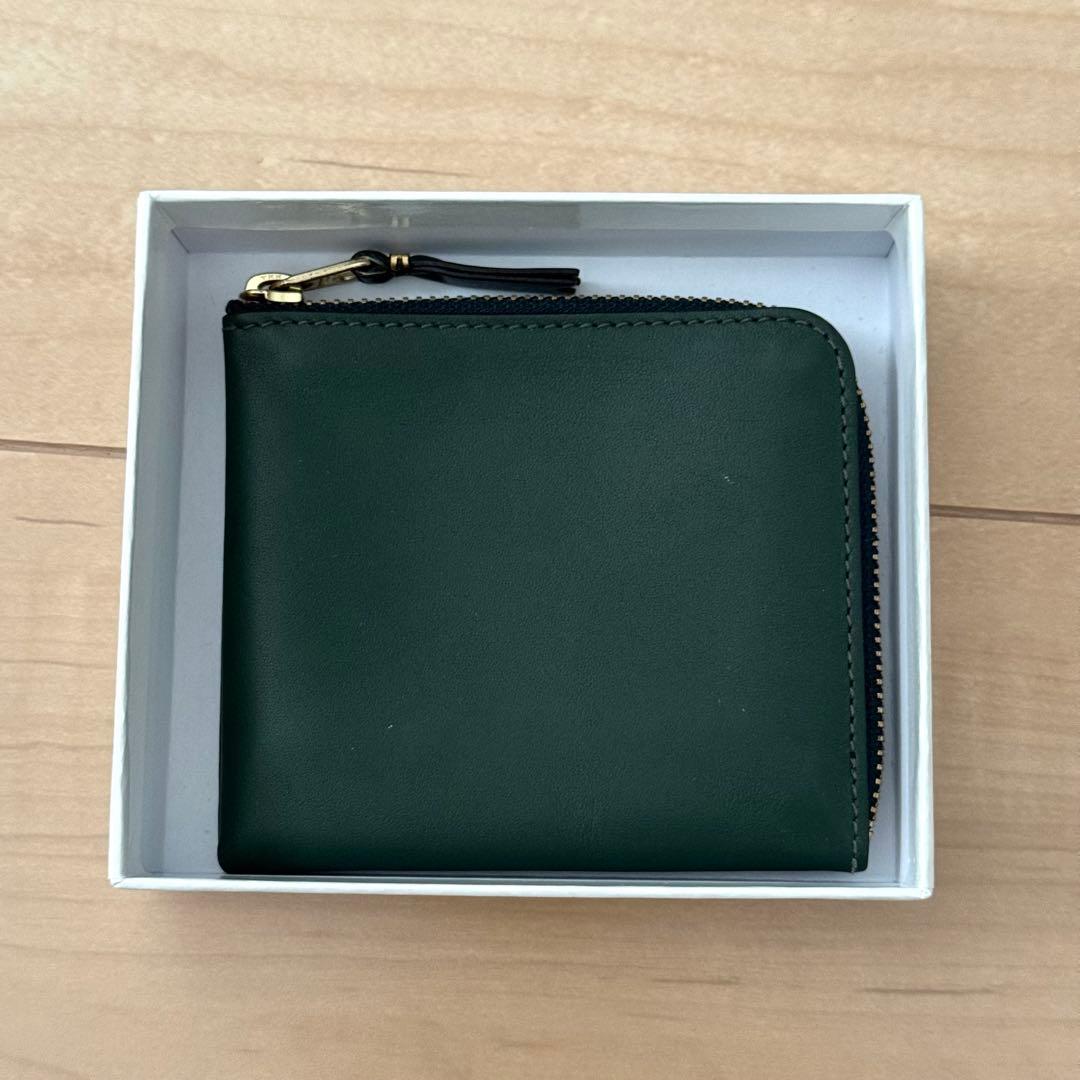 COMME des GARCONS ダークグリーン ケース
