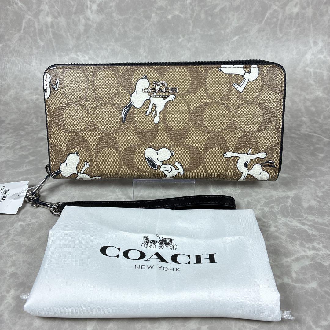 【未使用級】COACH×スヌーピー コラボ長財布 シグネチャー 保管袋付き