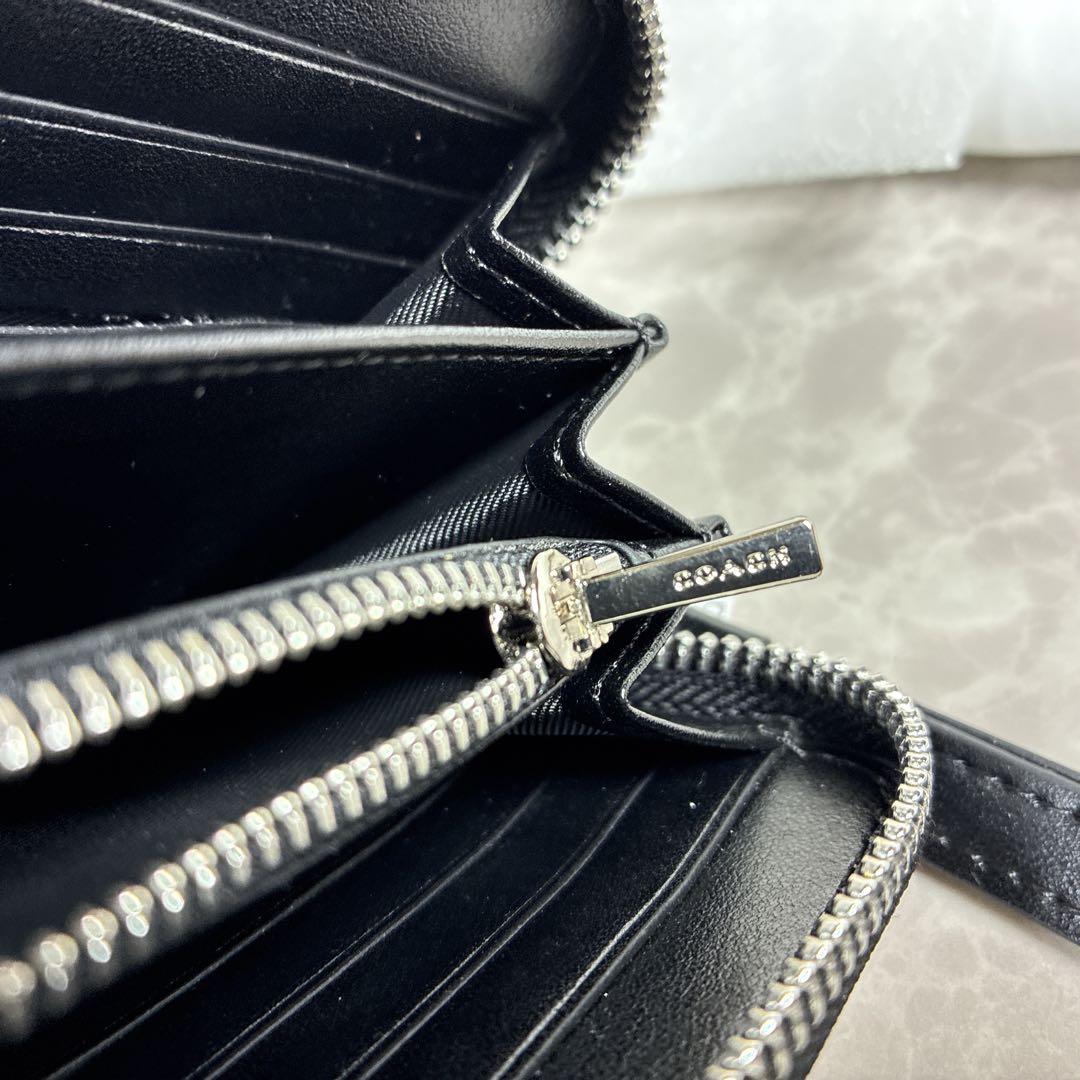 【未使用級】COACH×スヌーピー コラボ長財布 シグネチャー 保管袋付き