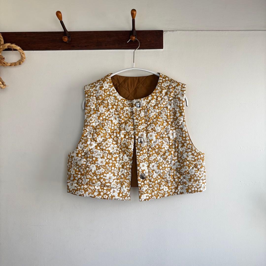 Porter des boutons キルティングリバーシブルショートジレ