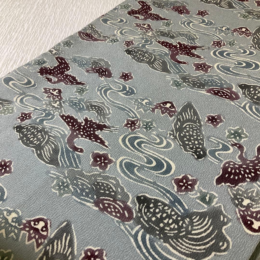 名古屋帯　縮緬　型染め　うすずみ色系　垂れ無地　亀　鶴？　流水　花
