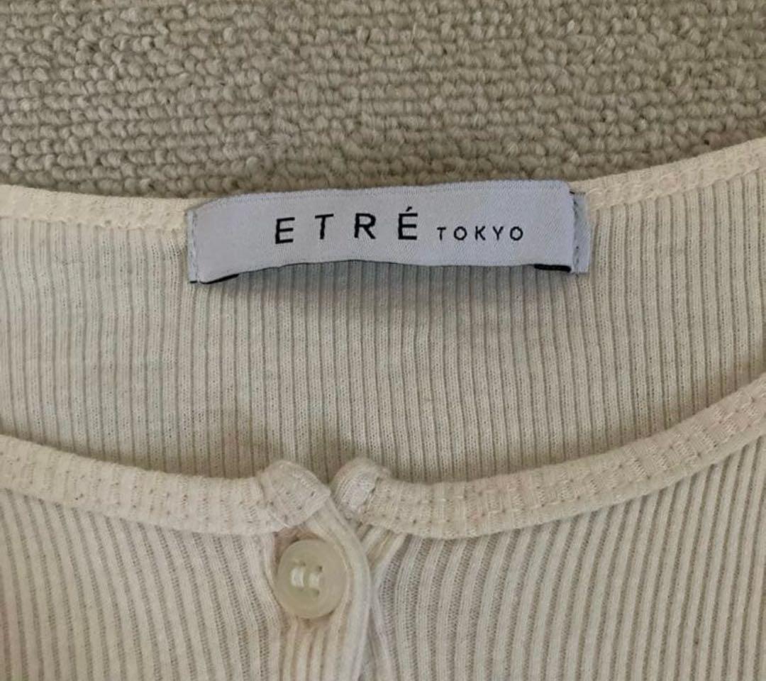 ETRE TOKYO オーコットテレコヘンリーネックトップス