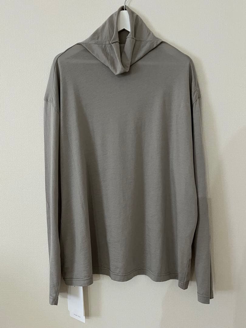 トップス evam eva