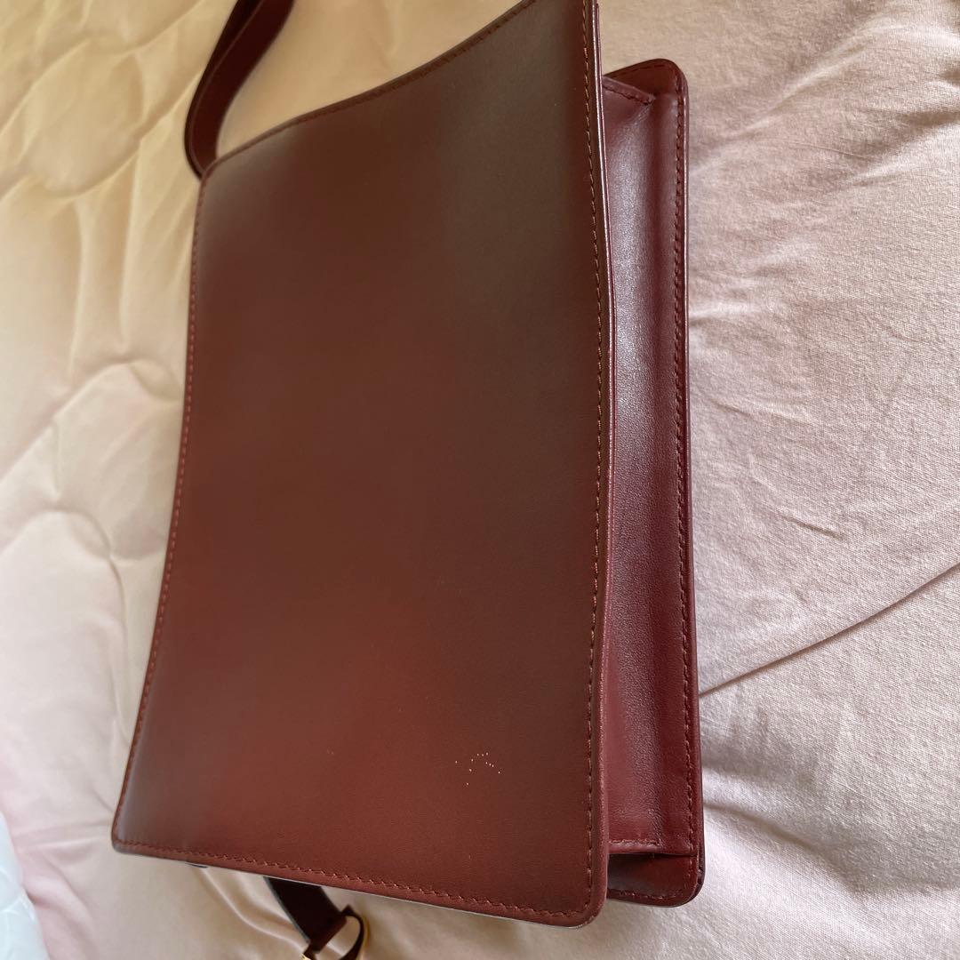 未使用　極美品　カルティエCartier ハンドバッグ　クラッチバッグ　エンジ色