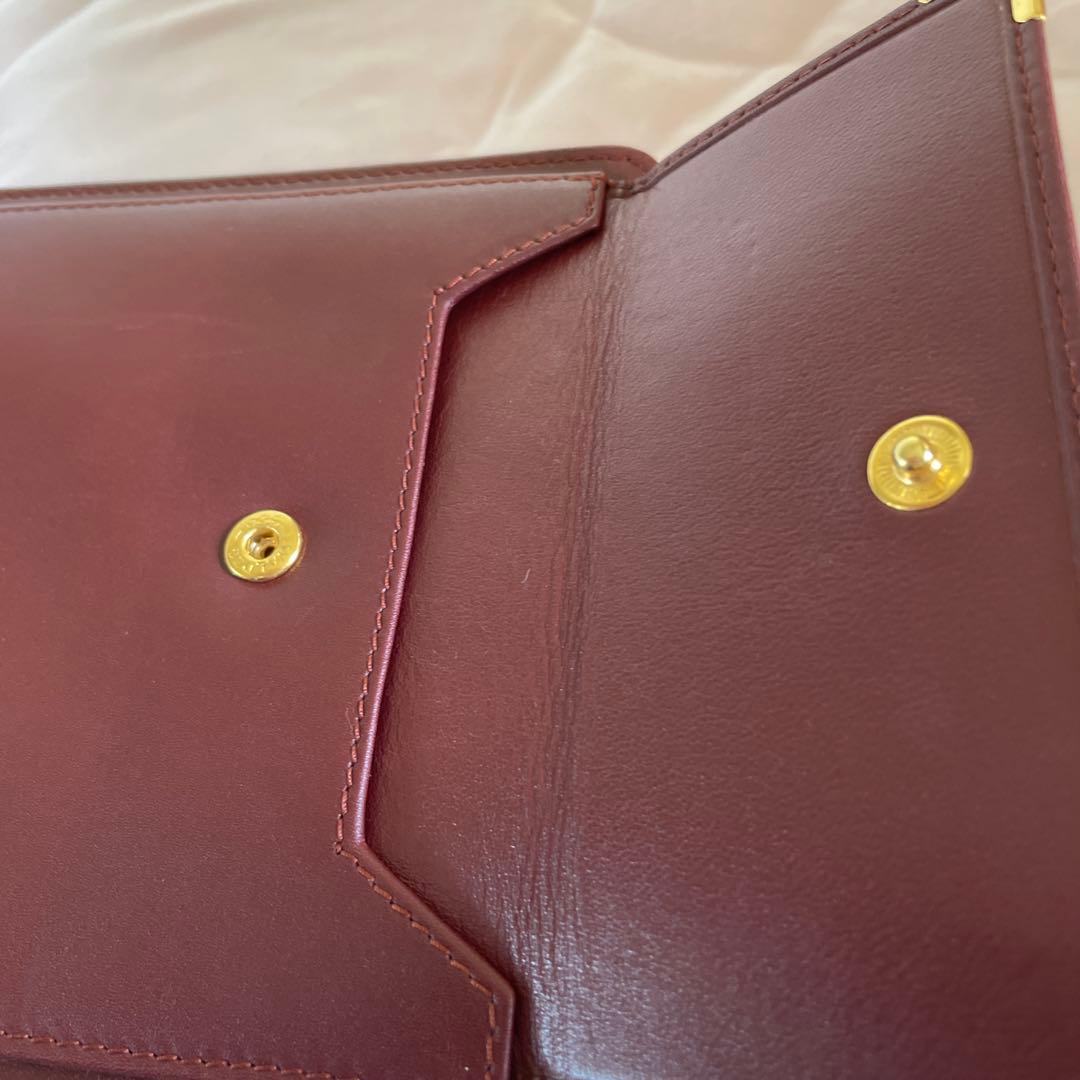 未使用　極美品　カルティエCartier ハンドバッグ　クラッチバッグ　エンジ色