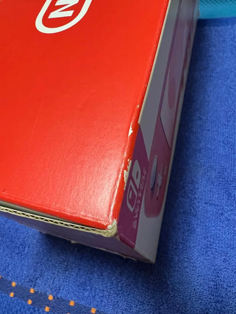 Nintendo Switch Lite コーラル整備済み品