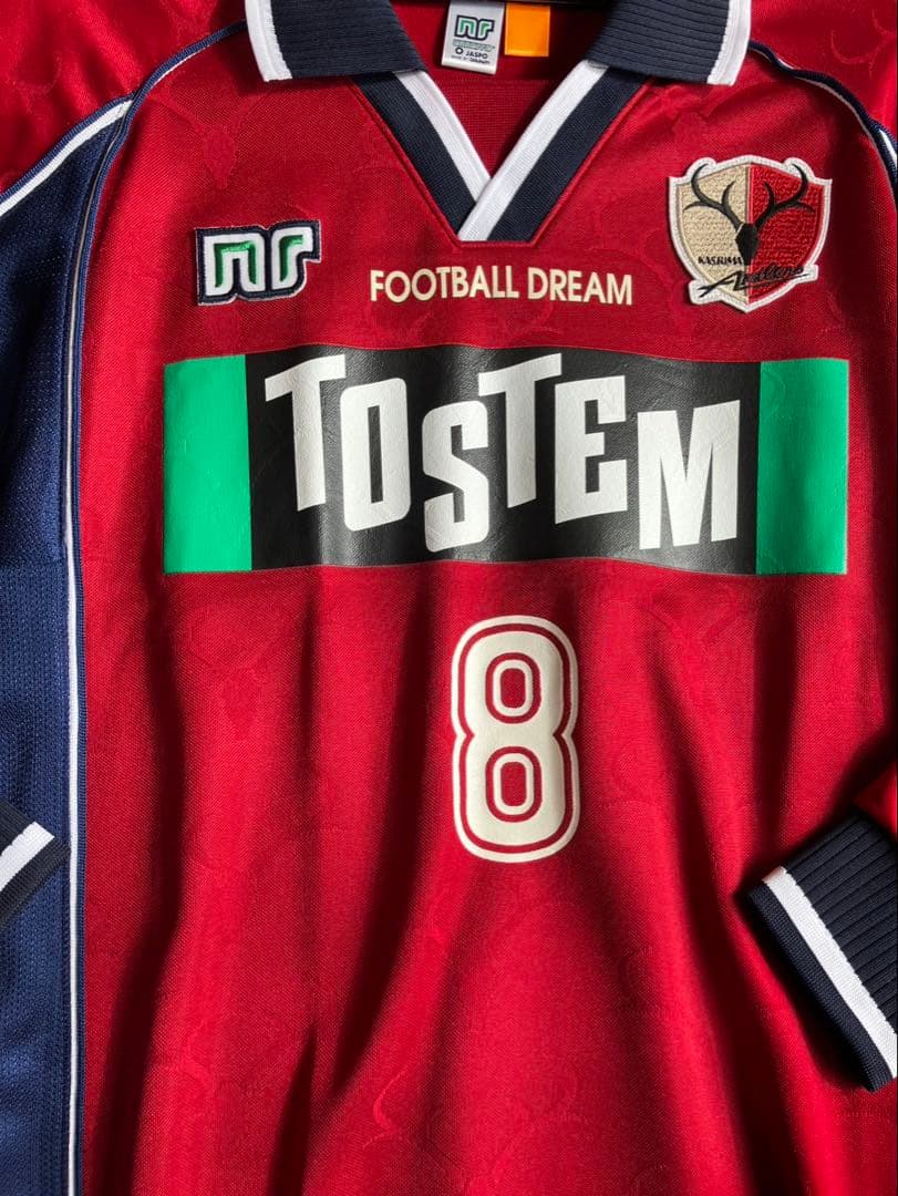 鹿島アントラーズ　ユニホームオレンジタグ　ベベットモデル