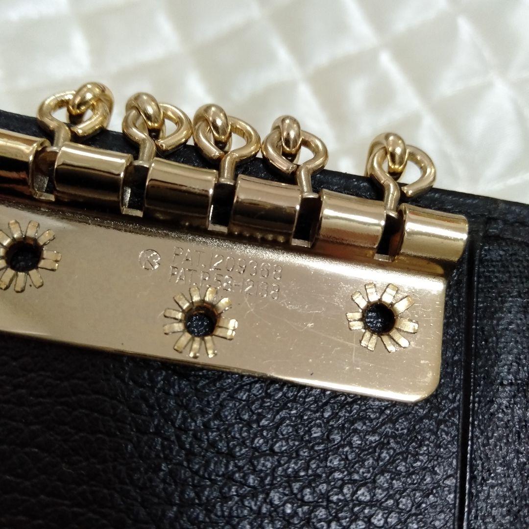 イブサンローラン　カサンドラロゴ型押し 三角プレート キーケースブラック