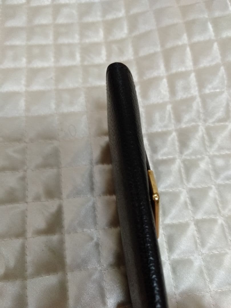 イブサンローラン　カサンドラロゴ型押し 三角プレート キーケースブラック