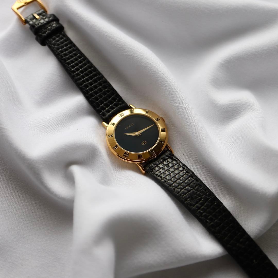 GUCCI ローマンベゼル ブラック文字盤 ゴールド レディース腕時計 1375