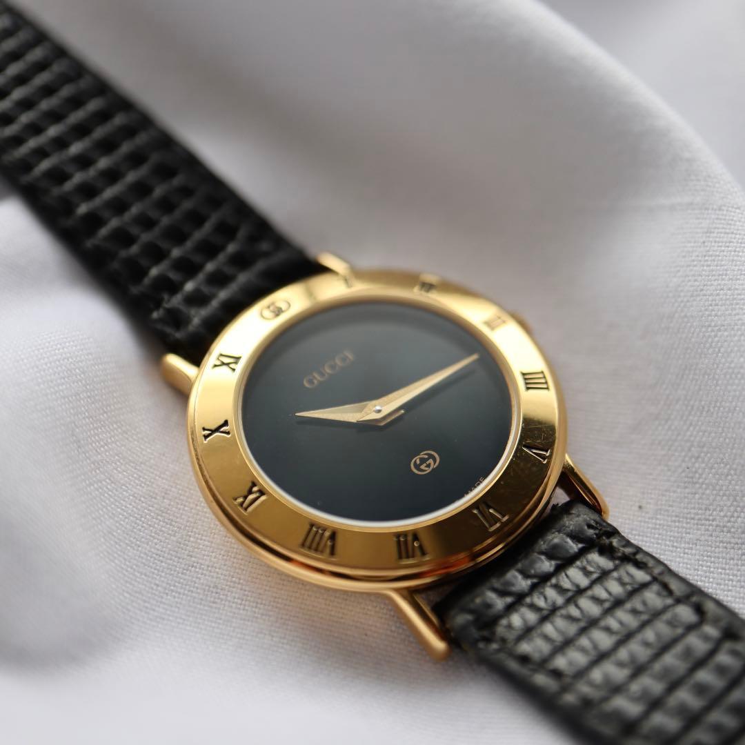 GUCCI ローマンベゼル ブラック文字盤 ゴールド レディース腕時計 1375