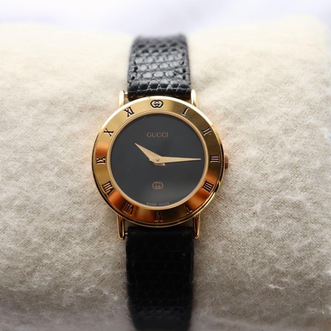 GUCCI ローマンベゼル ブラック文字盤 ゴールド レディース腕時計 1375