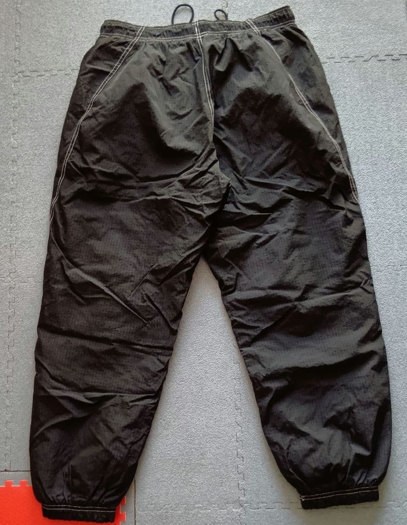 NIKE ナイロンパンツ 白ステッチ 刺繍ロゴ ブラック XL