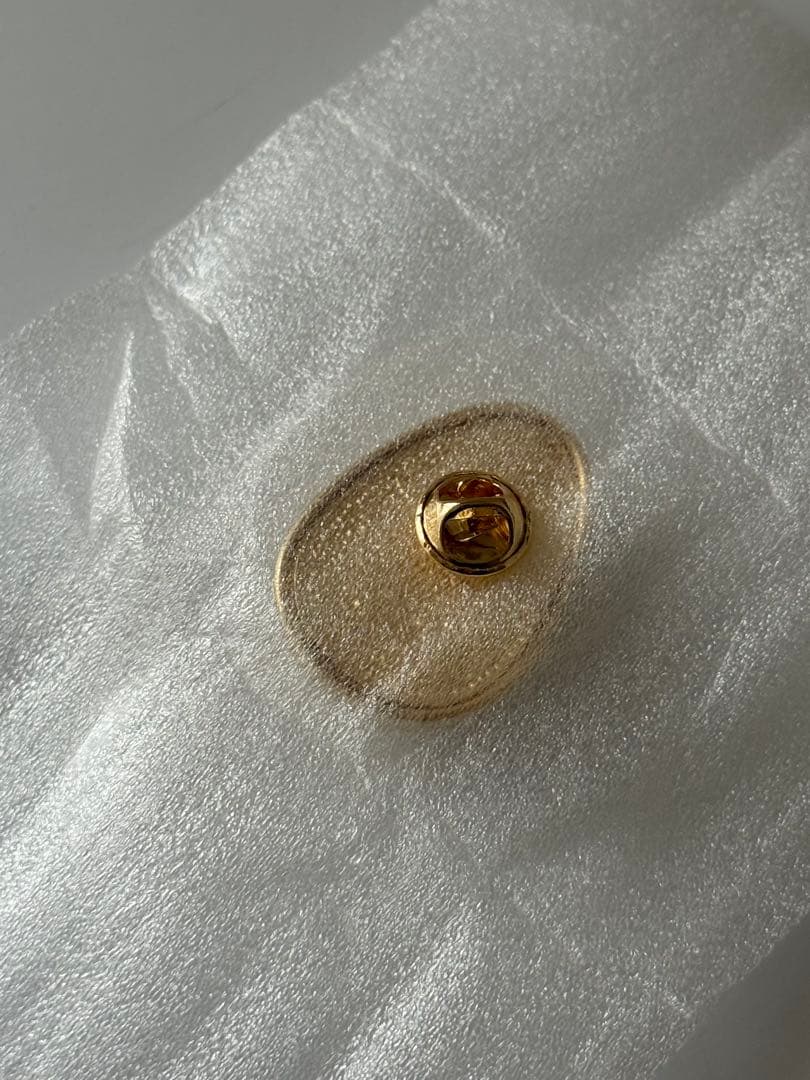 【洗える】エッグブローチ付きペプラムカーディガン