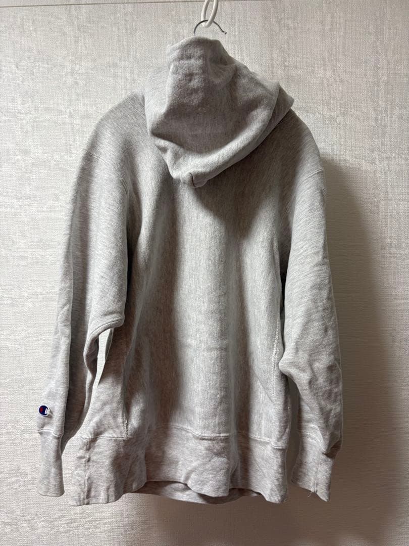 Champion グレー フード付きパーカー　リバースウィーブ