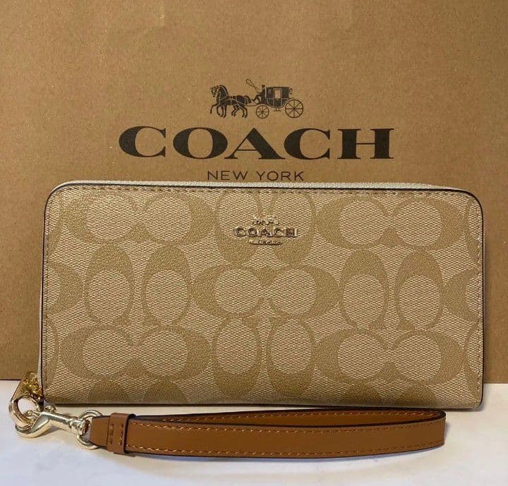 新品未使用コーチ長財布シグネチャーブラウンストラップ付きレディースメンズ送料無料