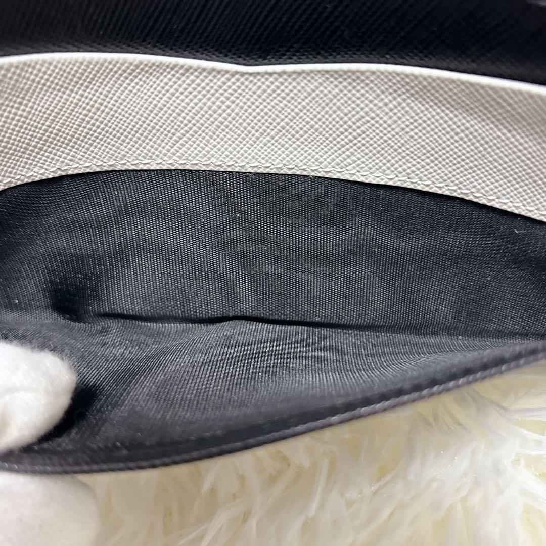 美品✨プラダ バイカラー フラップ 長財布 サフィアーノ ゴールド金具 黒 白