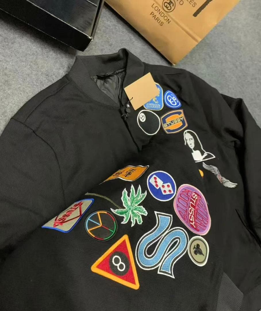 Stussy パッチ付き黒スタジャン