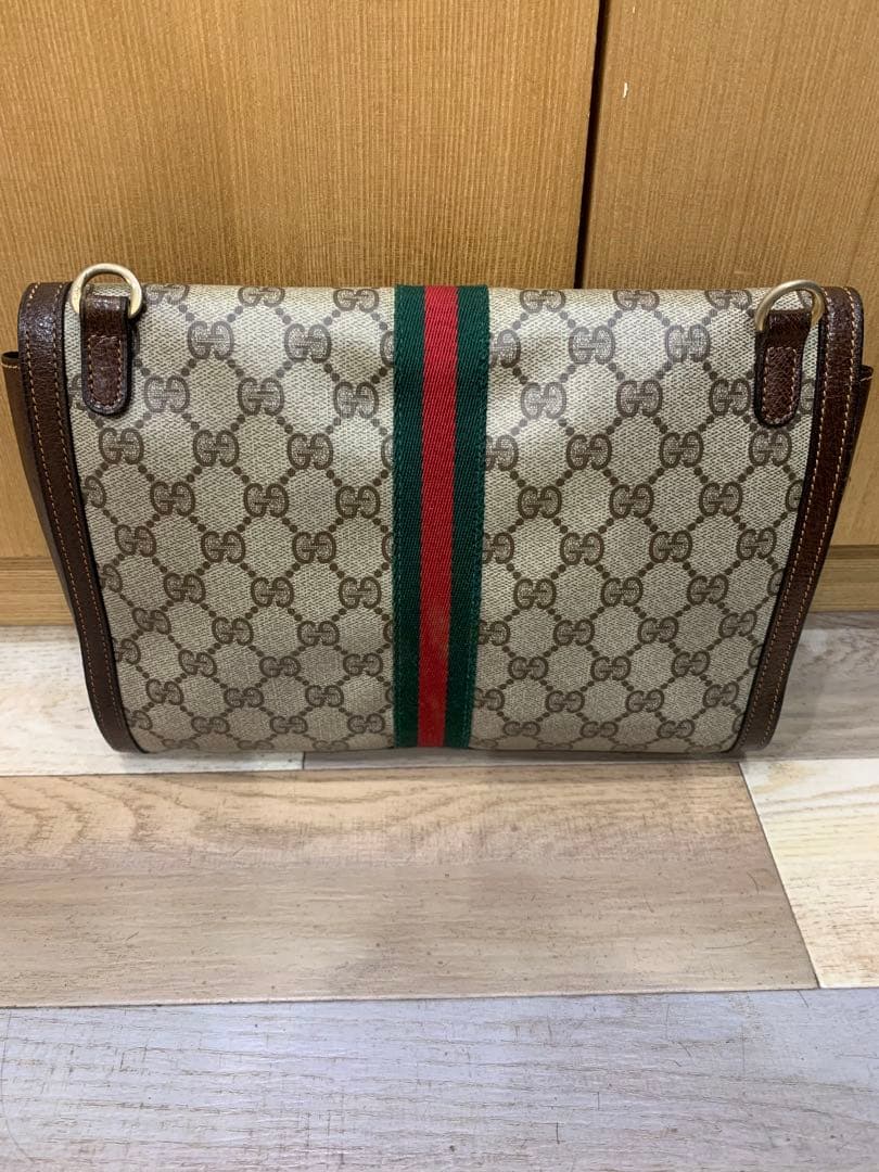 GUCCI GGキャンバス フラップクラッチバッグ