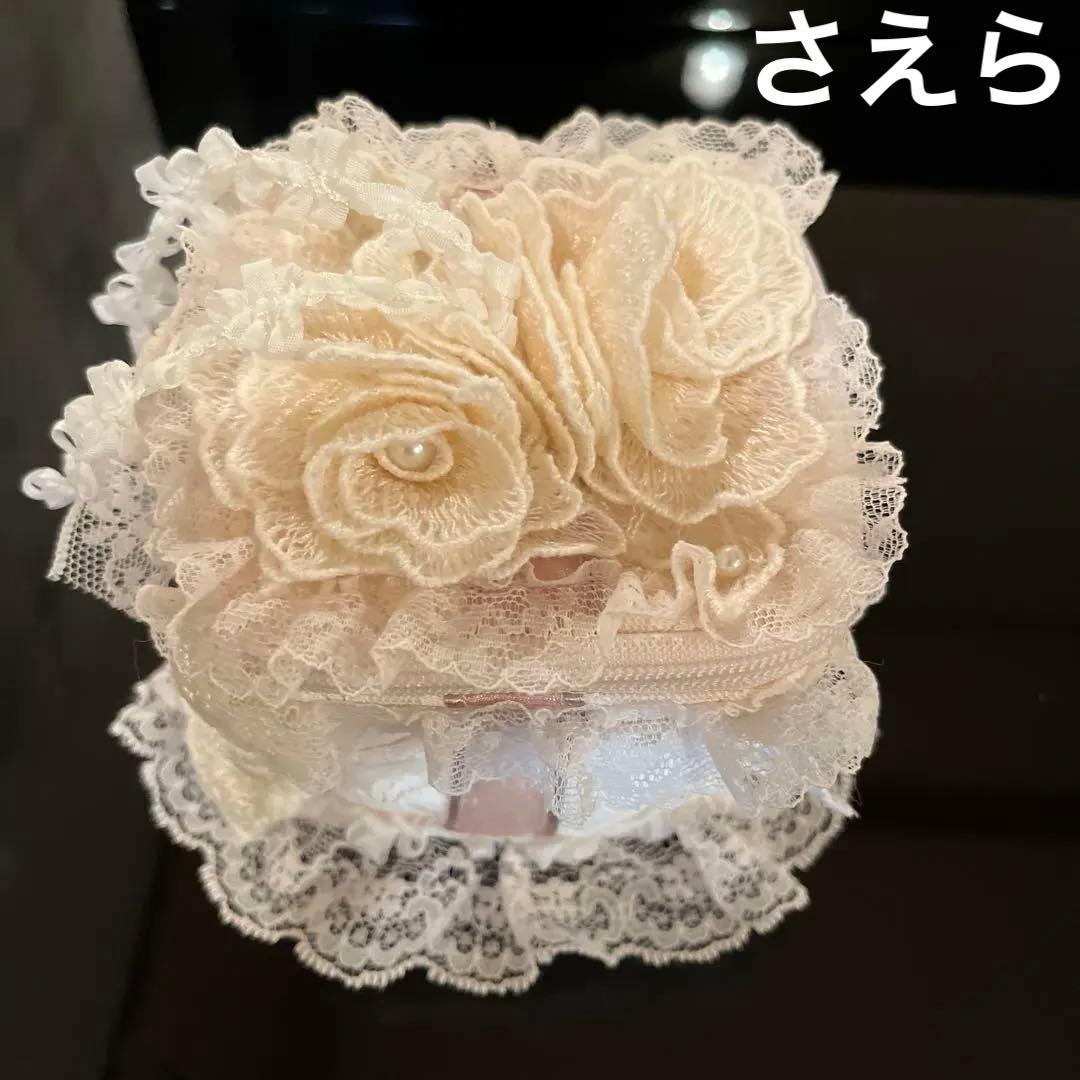 サエラ　ヒスクローネ　スクエア型ポーチ