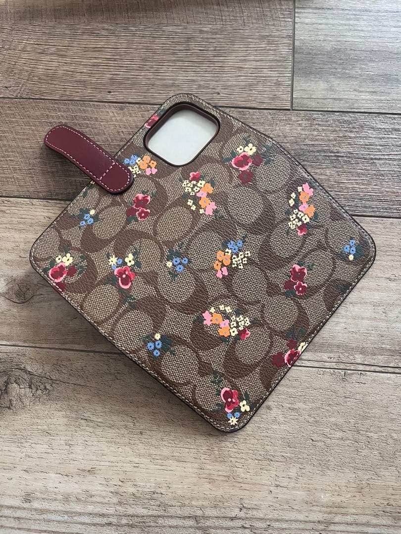 新品　COACH iPhone14pro 用　手帳型 シグネチャー　コーチ