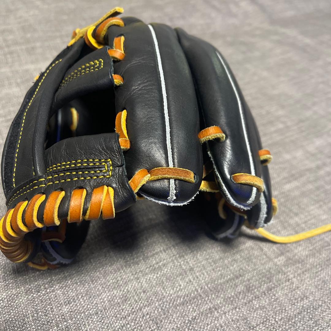 ず*な様 久保田スラッガー 軟式グローブ 黒/オレンジ　内野手用