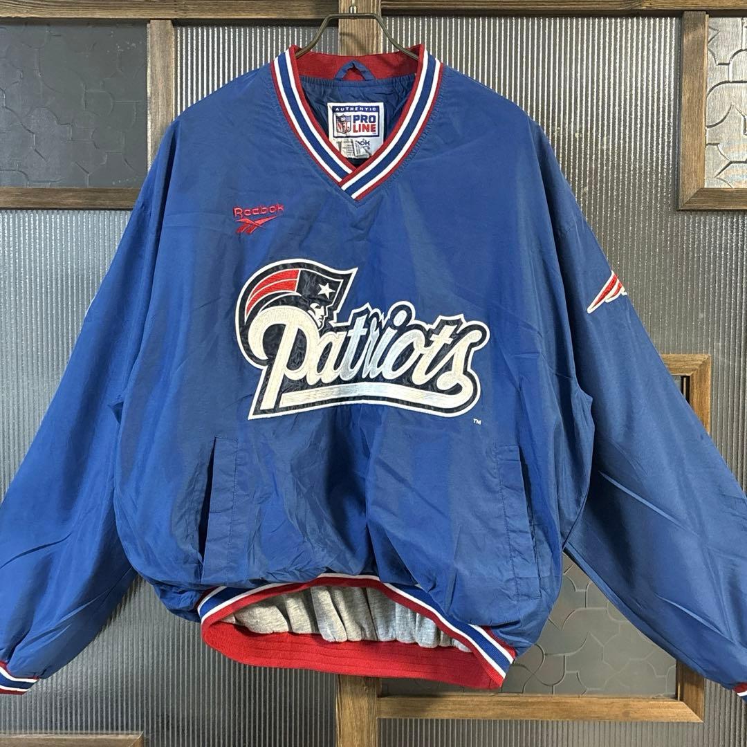 90s US古着　Reebok NFL ナイロンプルオーバー　M 青バック刺繍