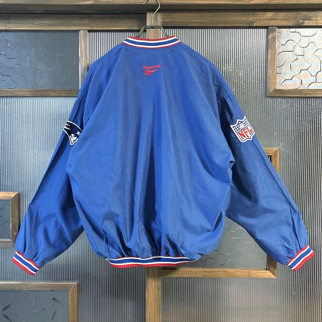 90s US古着　Reebok NFL ナイロンプルオーバー　M 青バック刺繍