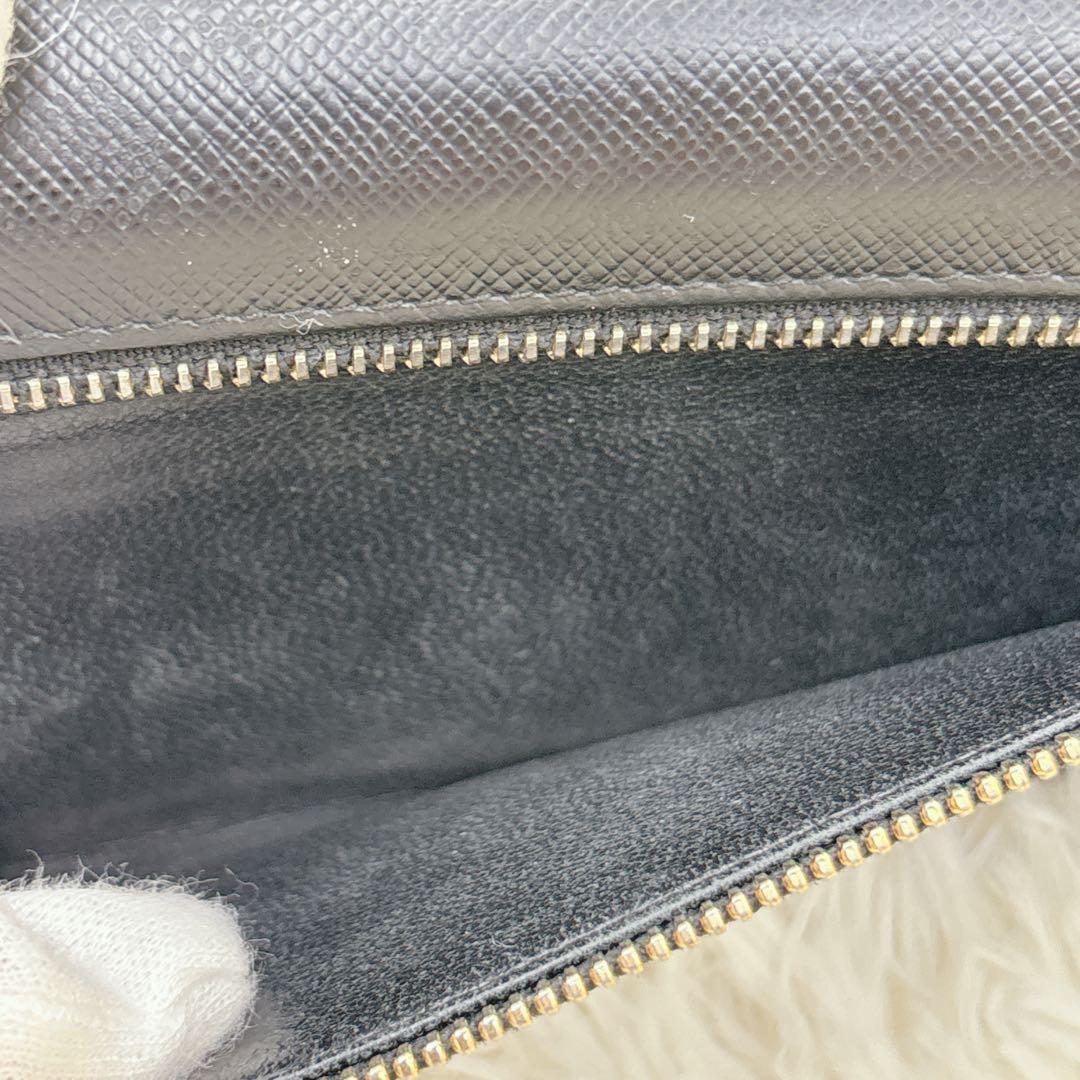 PRADA サフィアーノレザー フラップ 長財布 メタルロゴ ブラック