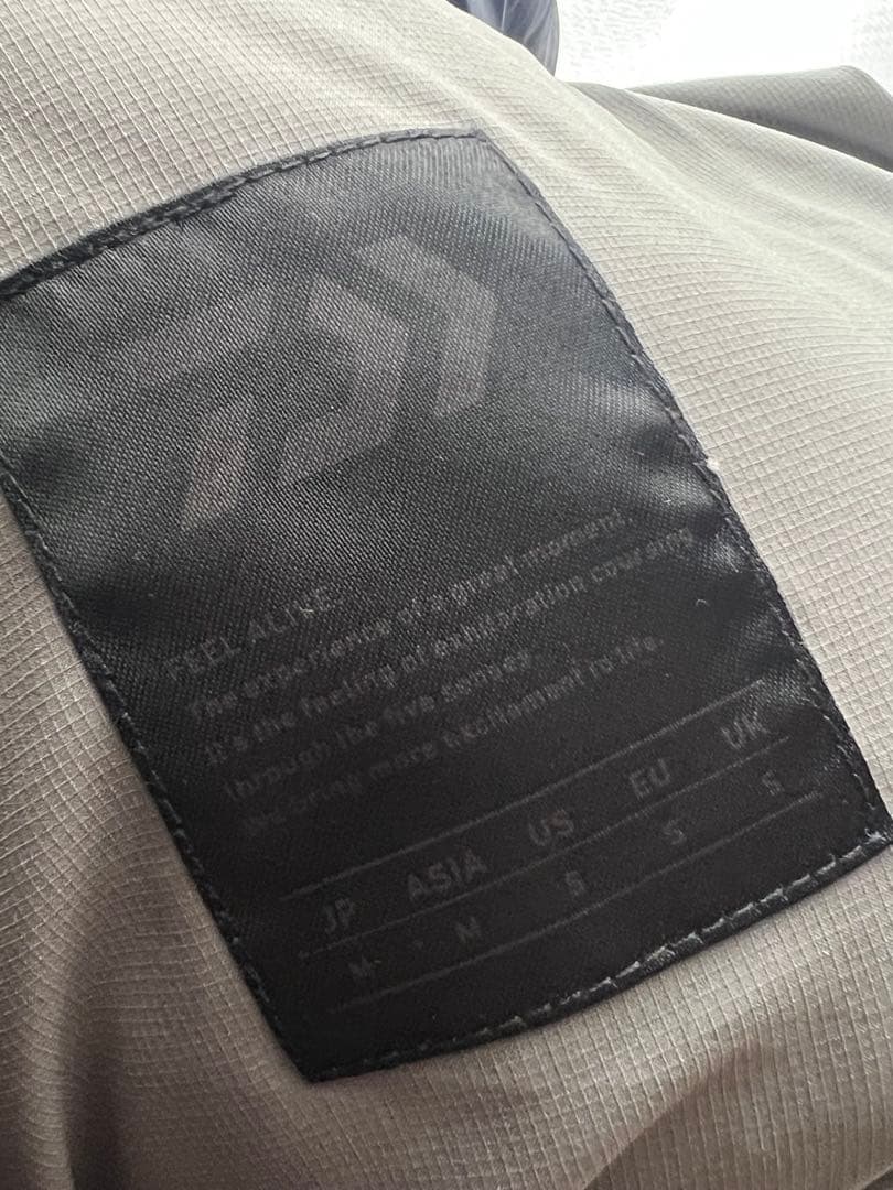 美品DAIWA PIER39 M TECH BACK PACKER ダウンベスト