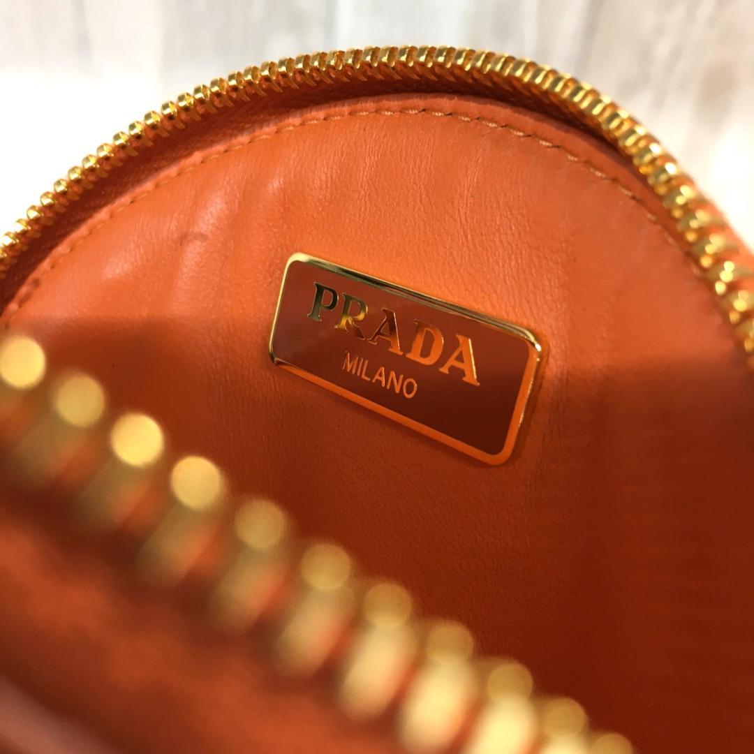 PRADA サフィアーノ ケース●オレンジ ラウンド 丸型 1M1443