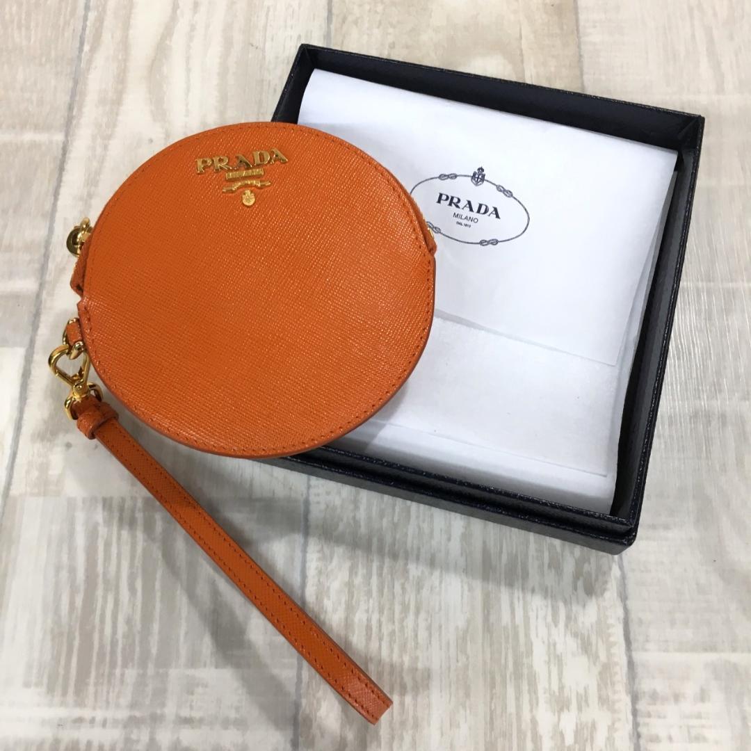 PRADA サフィアーノ ケース●オレンジ ラウンド 丸型 1M1443