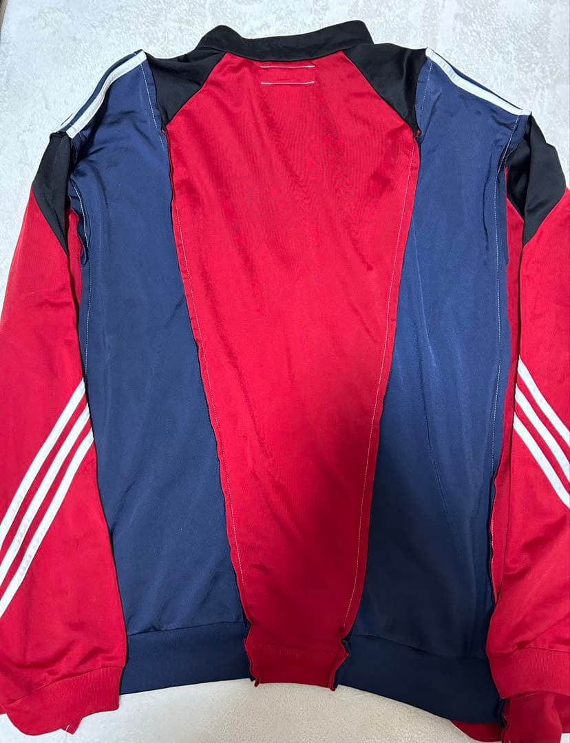 希少 DISCOVERED NEWSED 再構築 アディダス トラックジャケット