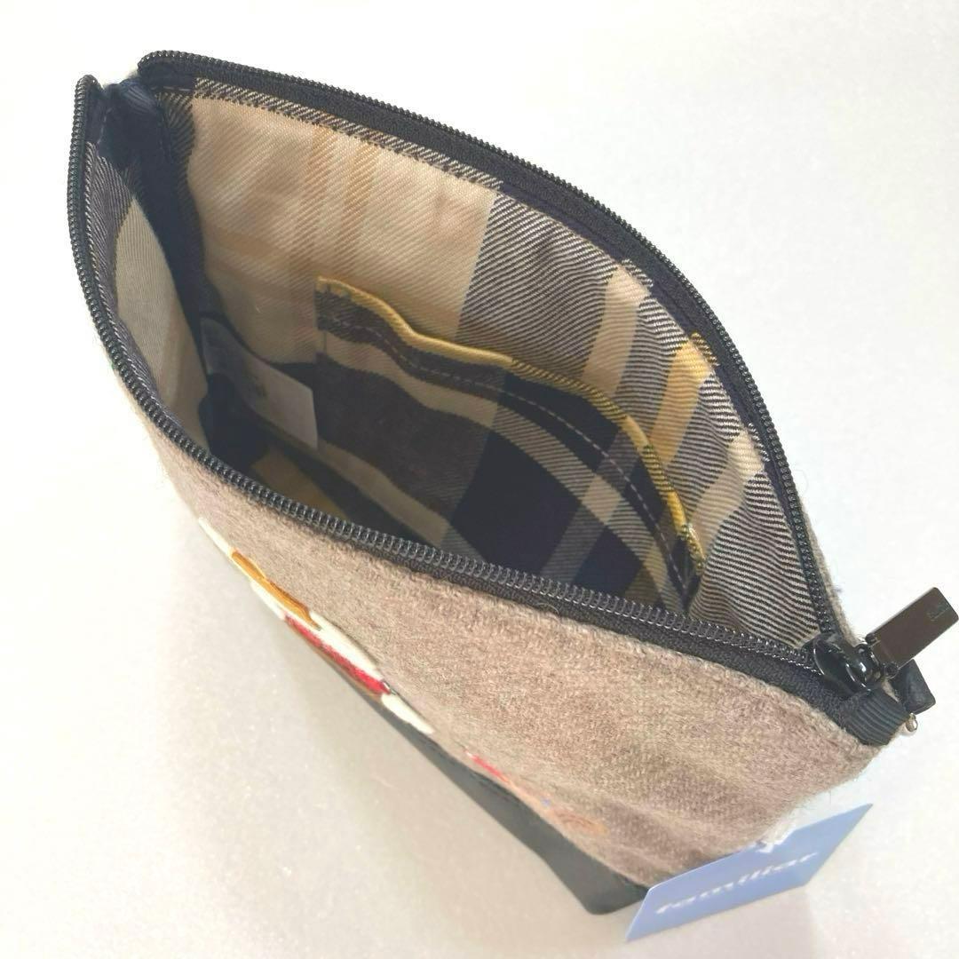 2024年秋のファミリアショーの タグ付ポーチと 新品未使用のハンカチのセット