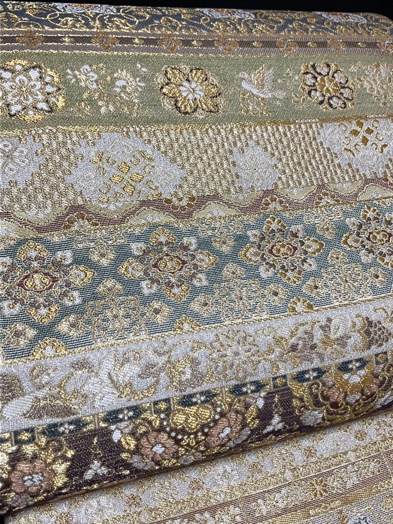 ツーシーズンリバーシブル袋帯 全通柄 正絹 正倉院百彩文 未使用に近いイ6524