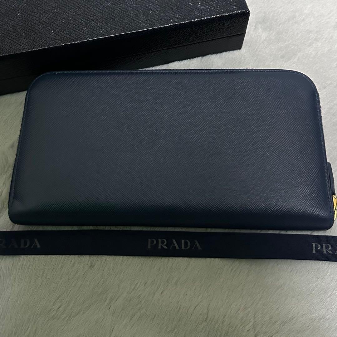 PRADA プラダ　長財布　リボン　ラウンドファスナー　ブルー　ゴールドロゴ