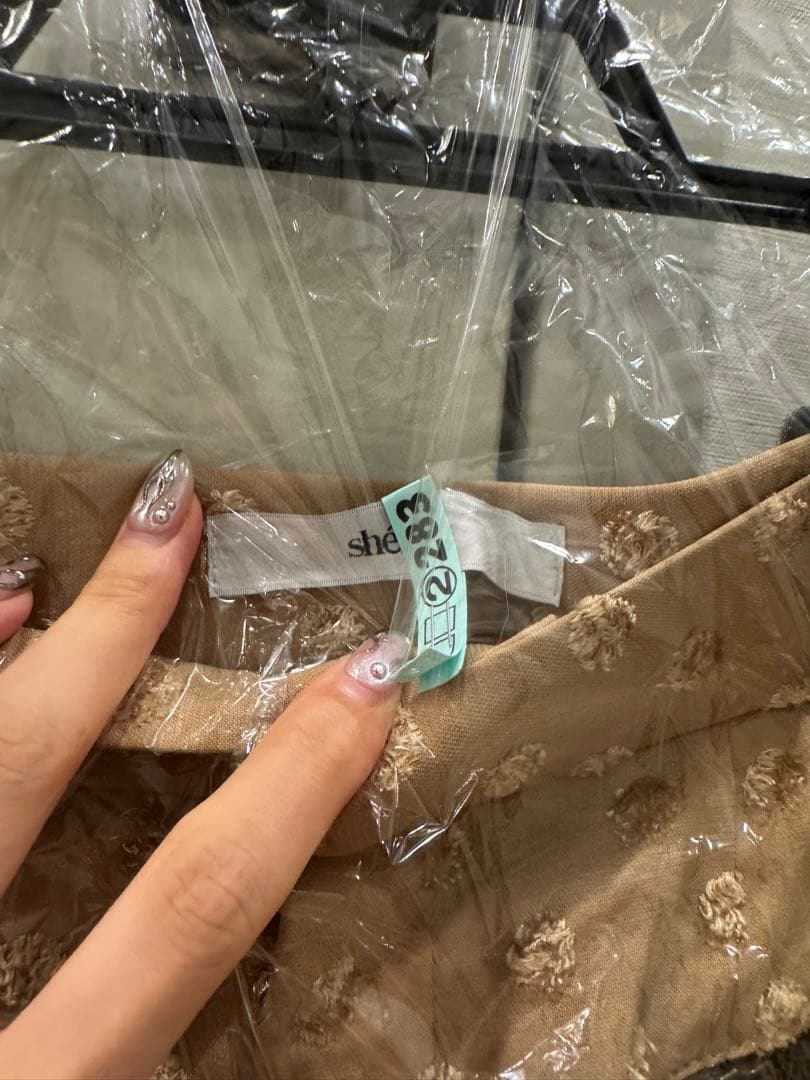 shéller ベージュミニスカート ポケット付き