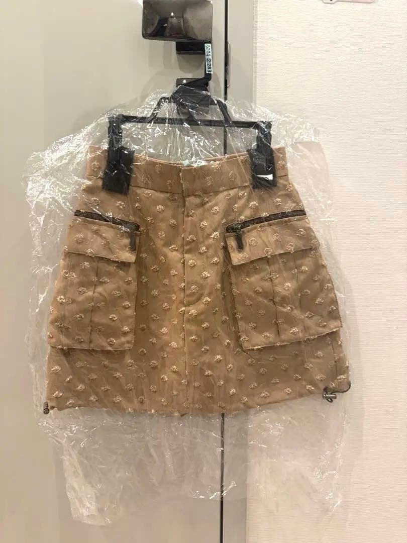 shéller ベージュミニスカート ポケット付き